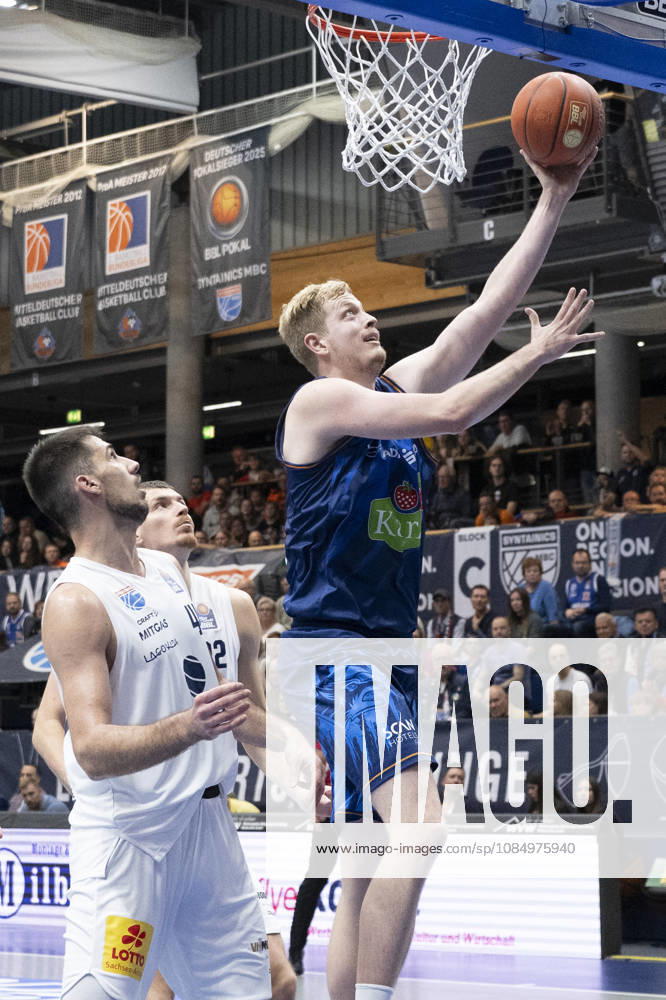 EasyCredit Basketball Bundesliga 2026–2027: Syntainics MBC vs. Rostock Seawolves, Weissenfels, Germany, October 24, 2026. Pictured from left: Jure Planinic (Weissenfels), Borisa Simanic (Weissenfels), and Bent Leuchten (Rostock). Weissenfels City Hall, Weissenfels, Saxony-Anhalt, Germany
