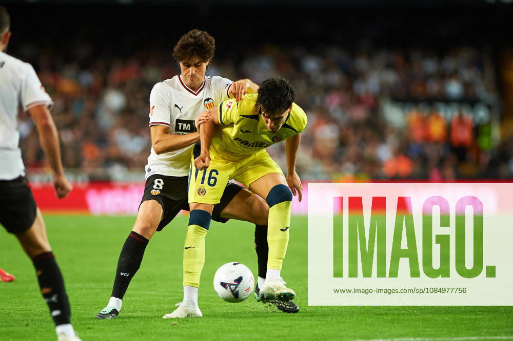 Carlos Macia of Villarreal CF and Javi Guerra of Valencia CF during the LaLiga EA Sports match between Valencia CF and Villarreal CF at Mestalla on October 24, 2026, in Valencia, Spain