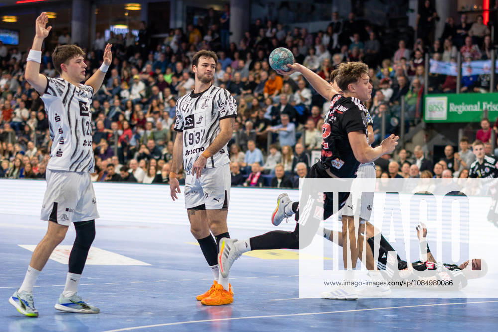 Maxsim Lochman, HC Erlangen, 32 (shooter), Rasmus Ankermann, THW Kiel, 22, Veron Nacinovic, THW Kiel, 93 (GER), HC Erlangen vs. THW Kiel, Handball, Opel Handball Bundesliga, Matchday 10, 2026–2027 Season, October 24, 2026, GER, HC Erlangen vs. THW Kiel, Handball, Opel Handball Bundesliga, Matchday 10, 2026–2027 season, October 24, 2026, Nuremberg