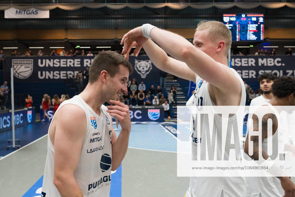 Spencer Reaves MBC, 31, and Collin Welp MBC, 40, celebrate the 103–98 overtime home victory: Syntainics MBC vs. Rostock Seawolves, BBL, Men’s Basketball 1st Bundesliga, Matchday 6 of the 2026–27 season, October 24, 2026, Weißenfels Stadthalle, Saxony-Anhalt, Germany