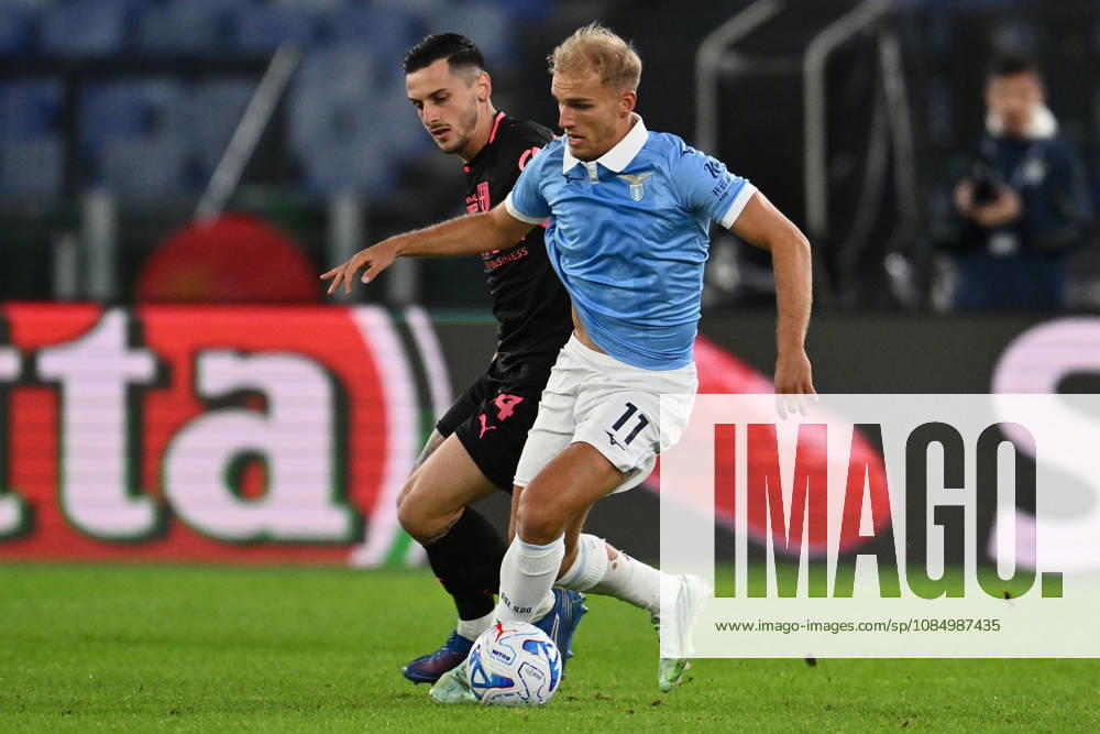 IPA90128634 - Emanuele Valeri of Parma Calcio 1913 and Gustav Isaksen of S.S. Lazio are in action during Matchday 8 of the Serie A Championship between S.S. Lazio and Parma Calcio 1913 at the Olympic Stadium on October 24, 2026, in Rome, Italy.