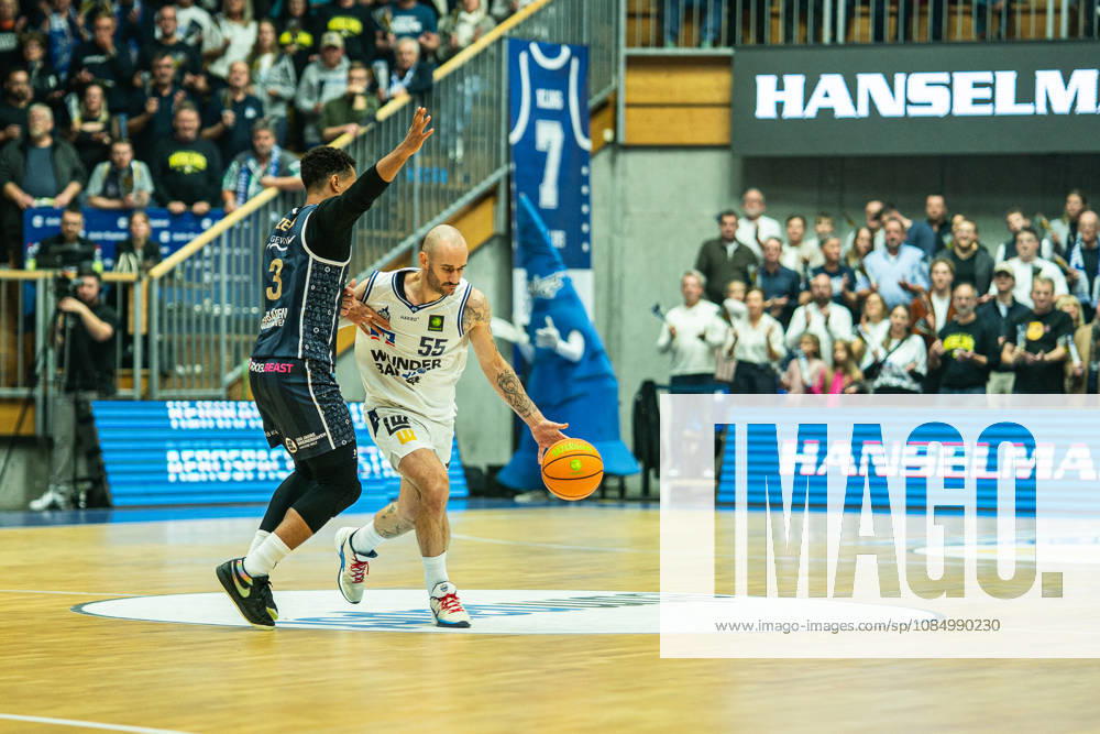 Simon Krajcovic of the Hakro Merlins Crailsheim, No. 55, dribbling against Garai Zeeb of the Eisbären Bremerhaven, No. 03, GER, Hakro Merlins Crailsheim vs. Eisbären Bremerhaven, Basketball, 2nd Basketball Bundesliga ProA, Men s, Matchday 6, 2026–2027 season, October 24, 2026, GER, Hakro Merlins Crailsheim vs. Eisbären Bremerhaven, Basketball, 2nd Basketball Bundesliga ProA, Men’s, Matchday 6, 2026–2027 season, October 24, 2026, Ilshofen
