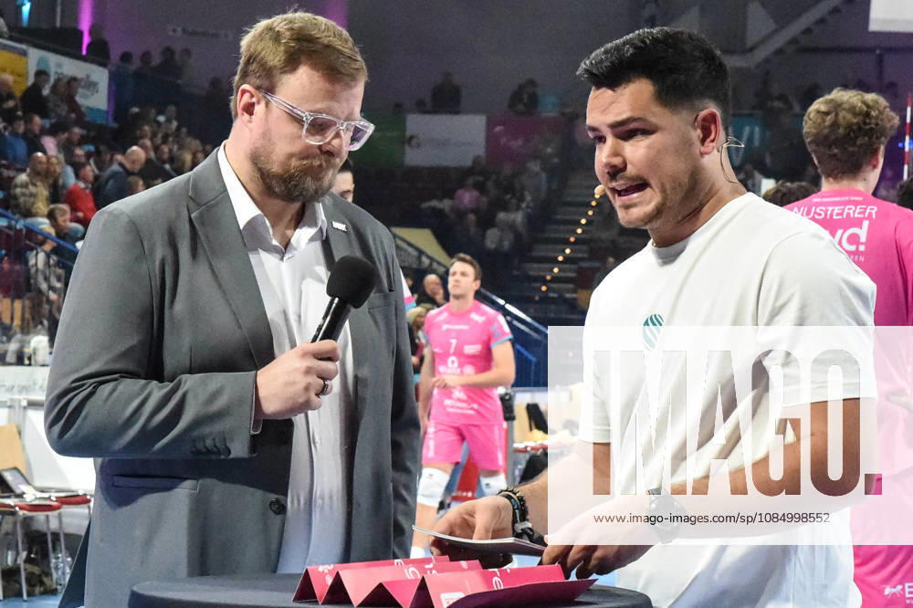 Tomasz Wasilkowski, Head Coach of WWK Volleys Munich; Philipp Ferebauer, arena announcer during the interview; TV, television, microphone; October 24, 2026; Düren, Germany; volleyball; Men s Bundesliga 1; regular season; SWD Powervolleys Düren vs. WWK Volleys Munich