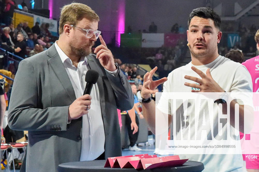 Tomasz Wasilkowski, Head Coach of WWK Volleys Munich; Philipp Ferebauer, arena announcer during the interview; TV, television, microphone; October 24, 2026; Düren, Germany; volleyball; Men s Bundesliga 1; regular season; SWD Powervolleys Düren vs. WWK Volleys Munich