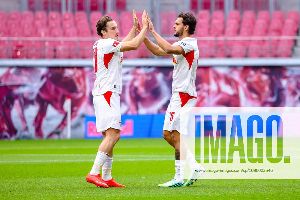 Rocco Reitz (RB Leipzig), 20, and Max Finkgraefe (RB Leipzig), 35, high-fiving before the game, GER, RB Leipzig vs. SV Elversberg, soccer, Bundesliga 1 Men, Matchday 7, 2026–2027 season, October 24, 2026. DFL regulations prohibit any use of photographs as image sequences and or quasi-video. GER, RB Leipzig vs. SV Elversberg, soccer, 1. Bundesliga Men, Matchday 7, 2026–2027 season, October 24, 2026, Leipzig