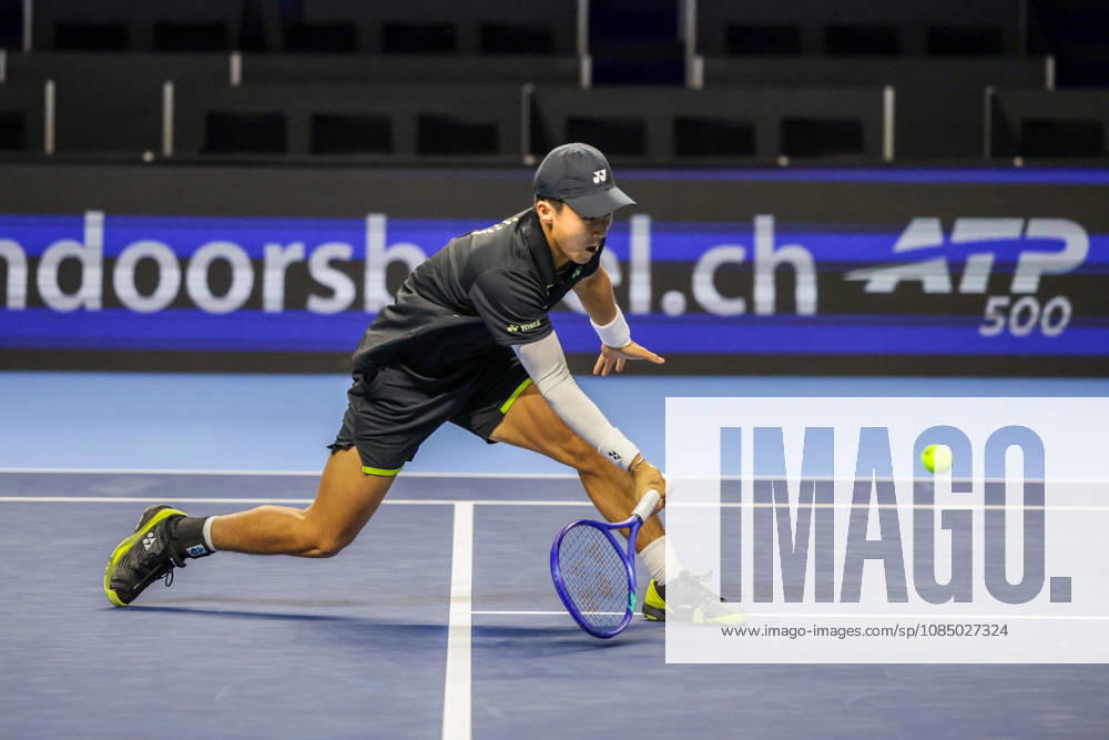 25th October 2026; St. Jakobshalle, Basel, Switzerland; ATP, Tennis Herren Tennis, Swiss Indoors Basel, Day 2; Qualifying final; Rinky Hijikata of Australia stretches for the ball AnthonyxBenoit