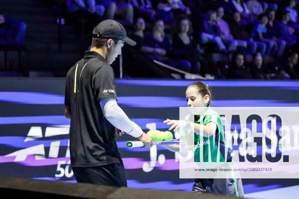 25th October 2026; St. Jakobshalle, Basel, Switzerland; ATP, Tennis Herren Tennis, Swiss Indoors Basel, Day 2; Qualifying final; Rinky Hijikata of Australia receives balls from a ball kid AnthonyxBenoit
