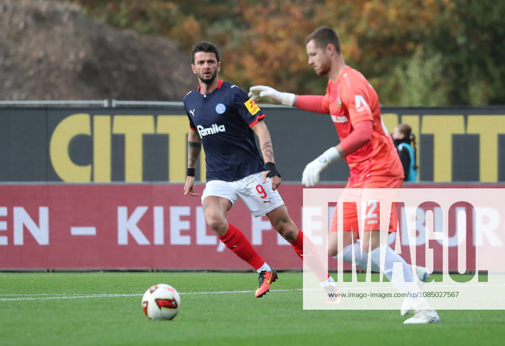 Goalkeeper Lennart Grill, Dynamo Dresden; Giorgi Kvilitaia, Holstein Kiel; Soccer, Men s, 2026–2027 Season, 2. Bundesliga, Holstein Stadium, Holstein Kiel vs. Dynamo Dresden. DFL regulations prohibit any use of photographs as image sequences and or quasi-video.