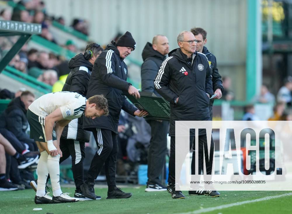 Alistair Johnston of Celtic prepares to come on as a substitute for Colby Donovan, with Celtic Manager Martin O Neill, right Hibernian v Celtic, William Hill Scottish Premiership, Football, Easter Road, Edinburgh, Scotland, UK - 25 Oct 2026Edinburgh Easter Road Scotland United Kingdom