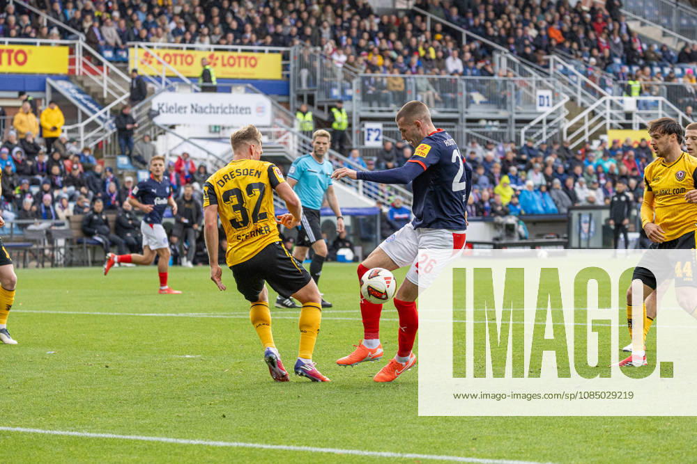 Soccer 2. Bundesliga Men s 2026–2027 Season, Matchday 9: Holstein Kiel vs. Dynamo Dresden; Kiel in dark blue, Dresden in yellow; Jonas Sterner (left), David Zec; Kiel Holstein Stadium, Westring 501, Schleswig-Holstein, Germany