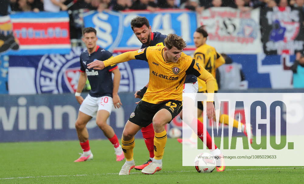 Friedrich Mueller, Dynamo Dresden; Giorgi Kvilitaia, Holstein Kiel; Soccer, Men s, 2026–2027 Season, 2. Bundesliga, Holstein Stadium, Holstein Kiel vs. Dynamo Dresden. DFL regulations prohibit any use of photographs as image sequences and or quasi-video.