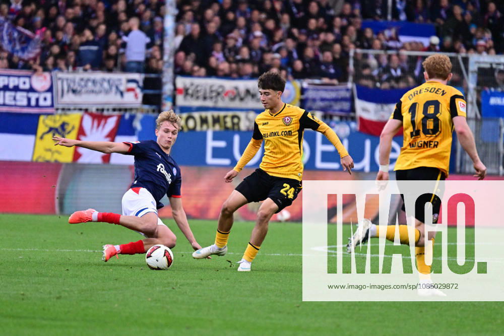 Soccer, Men s, 2nd Bundesliga, 2026–2027 Season, Holstein Kiel vs. SG Dynamo Dresden, Matchday 9, KSV, SGD, Holstein Stadium; Kasper Davidsen slides in against Patrice Covic, Kiel, Holstein Stadium, Holstein Stadium, Schleswig-Holstein, Germany