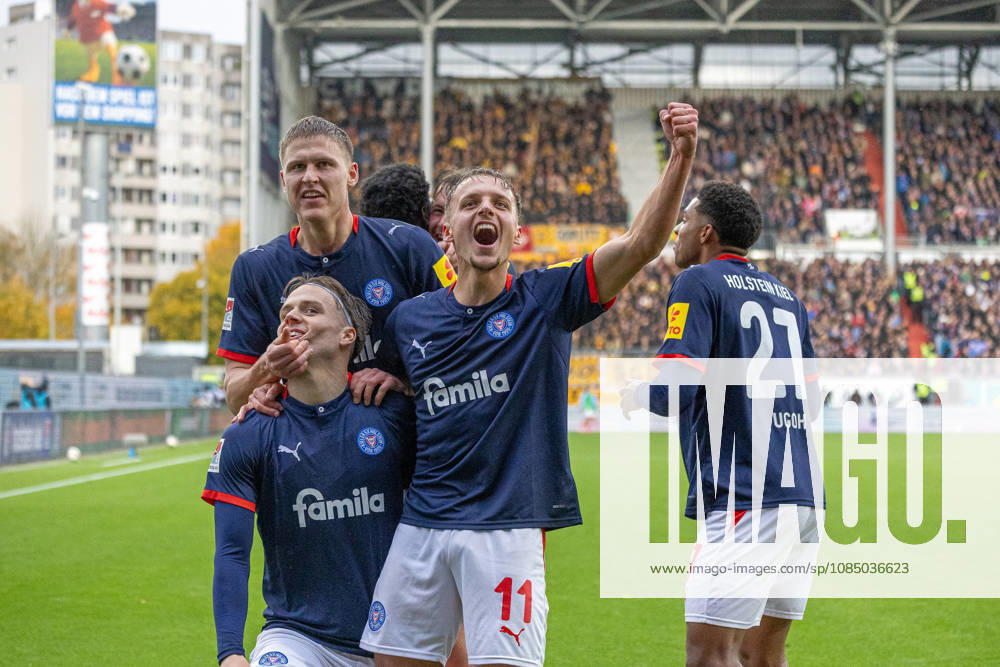 Soccer 2. Bundesliga Men s 2026–2027 Season, Matchday 9: Holstein Kiel vs. Dynamo Dresden. Kiel in dark blue, Dresden in yellow; 2–0 for Kiel. Front: Jonas Therkelsen (left), Gyan de Regt; Back: Phil Harres. Kiel Holstein Stadium, Westring 501, Schleswig-Holstein, Germany