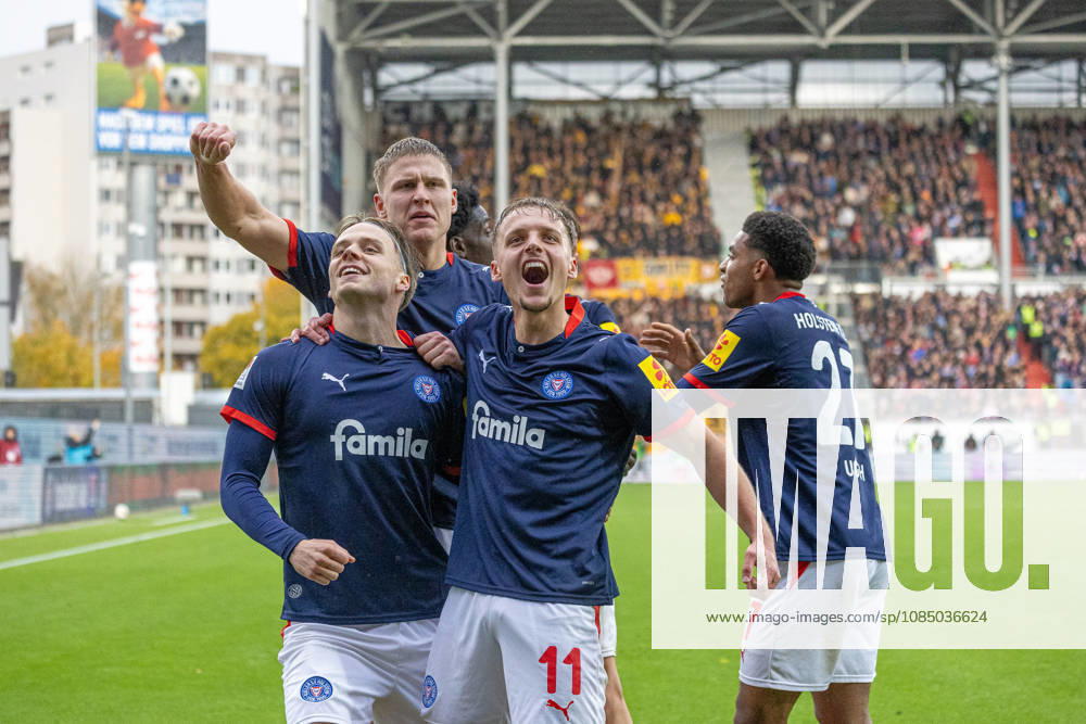 Soccer 2. Bundesliga Men s 2026–2027 Season, Matchday 9: Holstein Kiel vs. Dynamo Dresden. Kiel in dark blue, Dresden in yellow; 2–0 for Kiel. Front: Jonas Therkelsen (left), Gyan de Regt; Back: Phil Harres. Kiel Holstein Stadium, Westring 501, Schleswig-Holstein, Germany