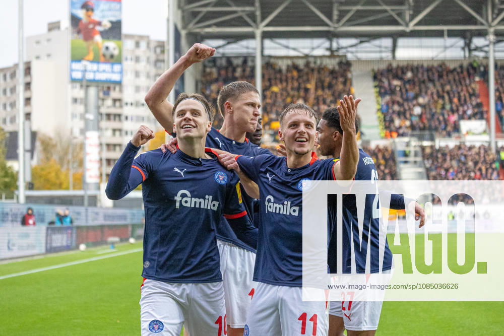 Soccer 2. Bundesliga Men s 2026–2027 Season, Matchday 9: Holstein Kiel vs. Dynamo Dresden. Kiel in dark blue, Dresden in yellow; 2–0 for Kiel. Front: Jonas Therkelsen (left), Gyan de Regt; Back: Phil Harres. Kiel Holstein Stadium, Westring 501, Schleswig-Holstein, Germany