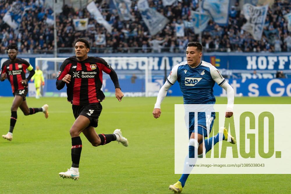 Tackle, one-on-one between Jarell Quansah (Bayer 04 Leverkusen, 04) and Adam Daghim (TSG Hoffenheim, 14), GER, TSG 1899 Hoffenheim vs. Bayer 04 Leverkusen, Soccer, Bundesliga 1, Matchday 7, 2026–2027 Season, October 25, 2026, DFL regulations prohibit any use of photographs as image sequences and or quasi-video, GER, TSG 1899 Hoffenheim vs. Bayer 04 Leverkusen, Soccer, Bundesliga 1, Matchday 7, 2026–2027 Season, October 25, 2026, Sinsheim