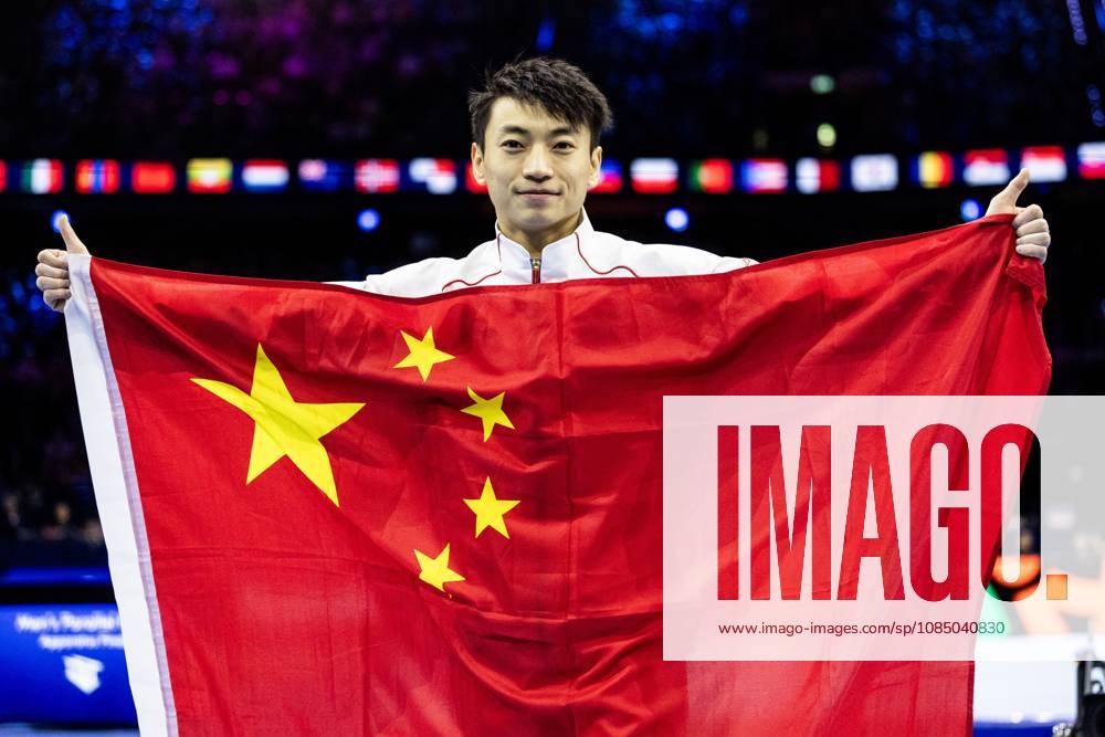 ROTTERDAM - Jingyuan Zou (CHN) reacts after winning the parallel bars apparatus final at the World Gymnastics Championships in Rotterdam Ahoy. IRIS VAN DEN BROEK ANP ANPxSportx IVx 573616498 originalFilename: 573616498