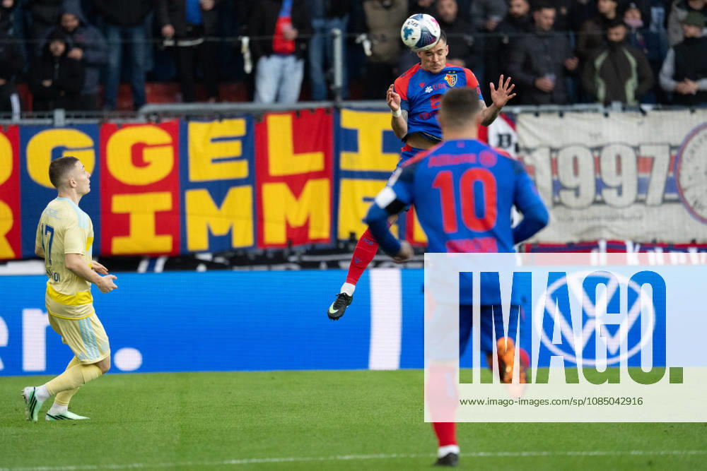 BASEL, SWITZERLAND, OCTOBER 24—Samuel Krasniqi of Grasshoppers L, Clement Michelin of Basel heads the ball toward Xherdan Shaqiri of Basel (right) during the Swiss Super League match between FC Basel 1893 and Grasshopper Club Zurich at St. Jakob Park on September 20, 2026, in Basel, Switzerland