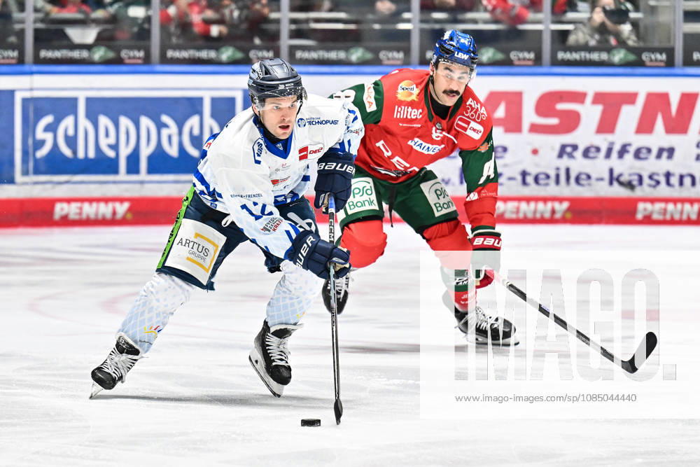 Penny DEL: Augsburger Panther vs. Straubing Tigers, October 25, 2026, AUGSBURG, GERMANY, OCTOBER 25: Joseph DUSZAK of the Straubing Tigers (No. 12) and Trevor PARKES of the Augsburger Panther (No. 84) face off during the Penny DEL match between the Augsburger Panther and the Straubing Tigers on Matchday 12 at Curt Frenzel Stadium