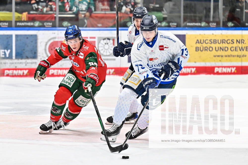 Penny DEL: Augsburger Panther vs. Straubing Tigers, October 25, 2026, AUGSBURG, GERMANY, OCTOBER 25: Jimmy LAMBERT of the Augsburger Panther (23) and Mario ZIMMERMANN of the Straubing Tigers (13) face off during the Penny DEL match between the Augsburger Panther and the Straubing Tigers on Matchday 12 at Curt Frenzel Stadium
