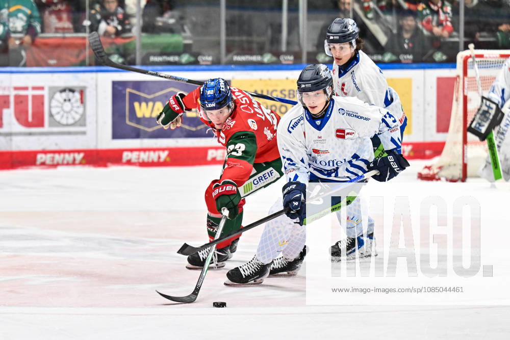 Penny DEL: Augsburger Panther vs. Straubing Tigers, October 25, 2026, AUGSBURG, GERMANY, OCTOBER 25: Jimmy LAMBERT of the Augsburger Panther (23) and Mario ZIMMERMANN of the Straubing Tigers (13) face off during the Penny DEL match between the Augsburger Panther and the Straubing Tigers on Matchday 12 at Curt Frenzel Stadium