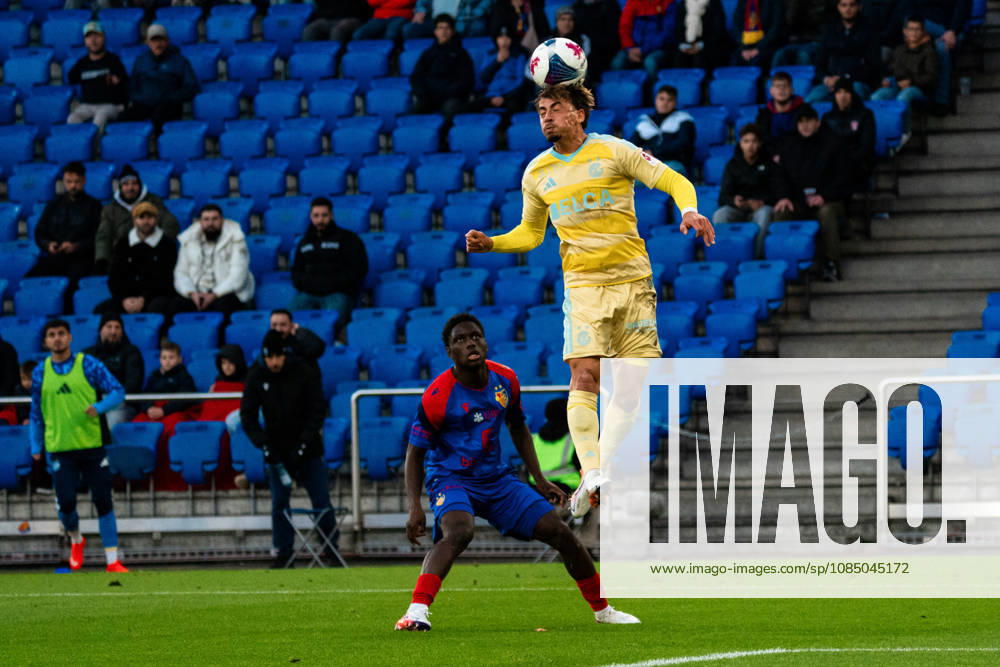 BASEL, SWITZERLAND, OCTOBER 24 — Moussa Cisse of Basel (left) and Samuele Bengondo of Grasshoppers in action during the Swiss Super League match between FC Basel 1893 and Grasshopper Club Zurich at St. Jakob Park on September 20, 2026, in Basel, Switzerland