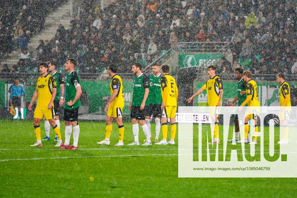 Both teams are waiting for a free kick and standing in heavy rain, Rain, German soccer, 3rd Division, 2026–27 season, Matchday 11, October 25, 2026, SC Preußen Münster vs. Fortuna Köln, LVM Preußenstadion Münster, North Rhine-Westphalia
