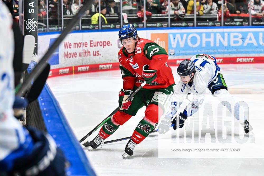 Penny DEL: Augsburger Panther vs. Straubing Tigers, October 25, 2026, AUGSBURG, GERMANY, OCTOBER 25: Jimmy LAMBERT of the Augsburger Panther (23) and Taro JENTZSCH of the Straubing Tigers (10) face off during the Penny DEL match between the Augsburger Panther and the Straubing Tigers on Matchday 12 at Curt Frenzel Stadium