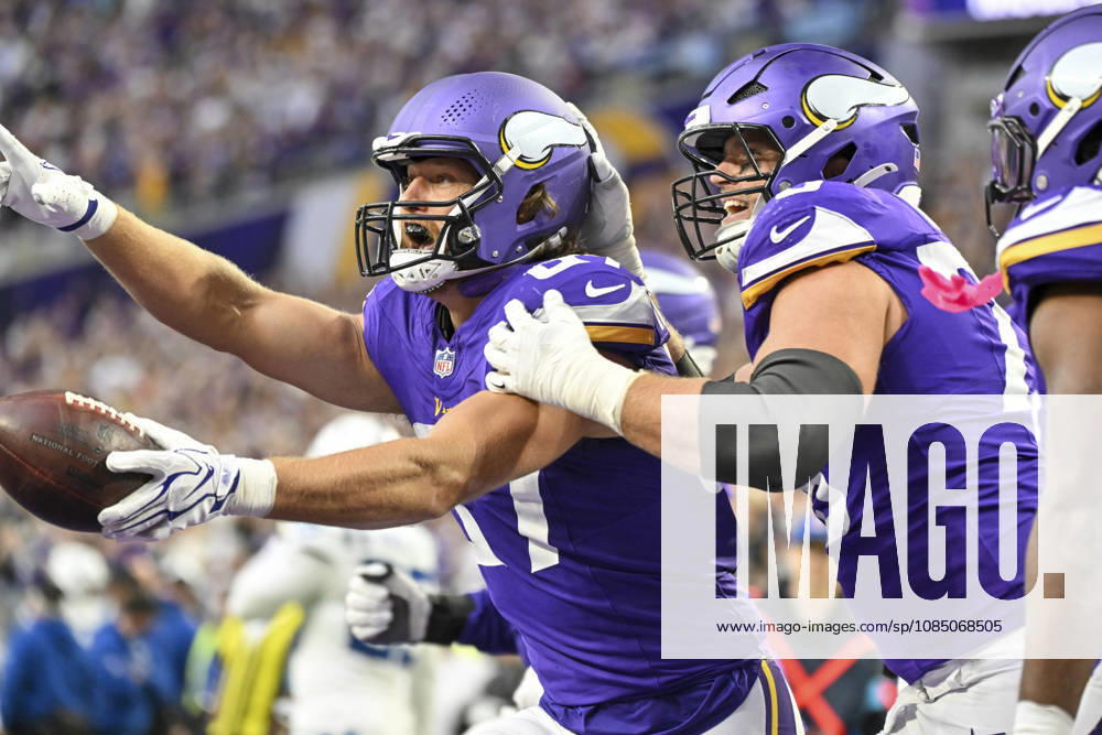 Minnesota Vikings tight end T.J. Hockenson, left, celebrates with offensive tackle Brian O Neill after scoring a touchdown against the Indianapolis Colts in the fourth quarter at U.S. Bank Stadium in Minneapolis, Minnesota on Sunday, October 25, 2026. Minnesota Vikings won 16-10. MIN20261025115 CRAIGxLASSIG