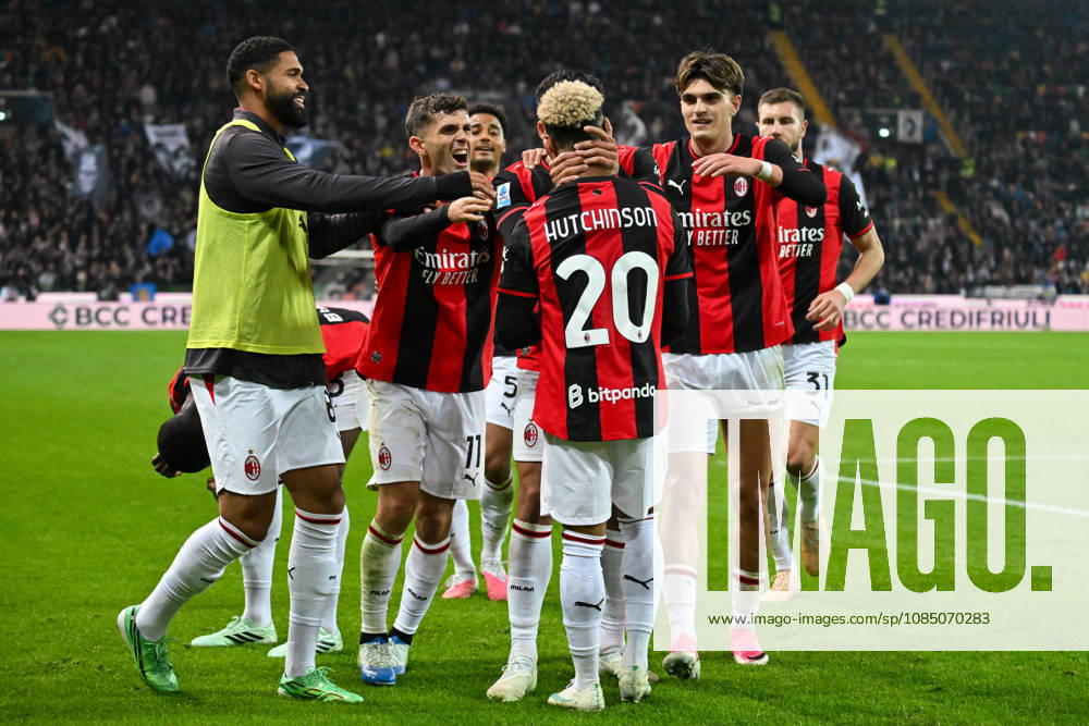 Milans Omari Hutchinson celebrates with his teammates after scoring a goal during the Italian Serie A soccer match between Udinese FC and AC Milan at the Bluenergy Stadium Stadio Friuli in Udine, Italy, 25 october 2026. ANSA . Serie A - Udinese Vs Milan - ZUMAa110 20261025_zaf_a110_045