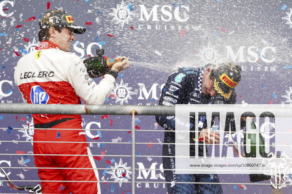 Formula One United States Grand Prix - Race Scuderia Ferrari driver Charles Leclerc (L) of Monaco and Mercedes driver Andrea Kimi Antonelli (R) of Italy celebrate on the podium following the 2026 Formula 1 United States Grand Prix at the Circuit of the Americas, in Austin, Texas, USA, 25 October 2026. AUSTIN TEXAS United States