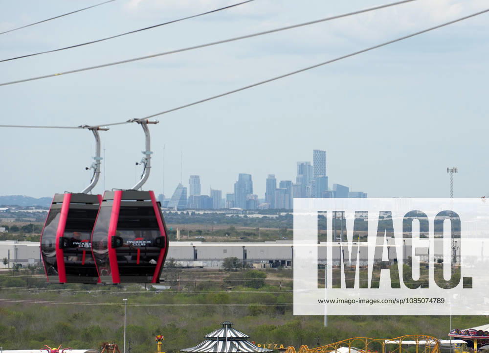 Circuit of The Americas, Austin, 2026 FORMULA 1 MSC CRUISES UNITED STATES GRAND PRIX, Shuttles travel back and forth between the main building in the paddock and the new station at the first turn, with the Austin skyline in the background. Photo by Hasan Bratic, DeFodi Images