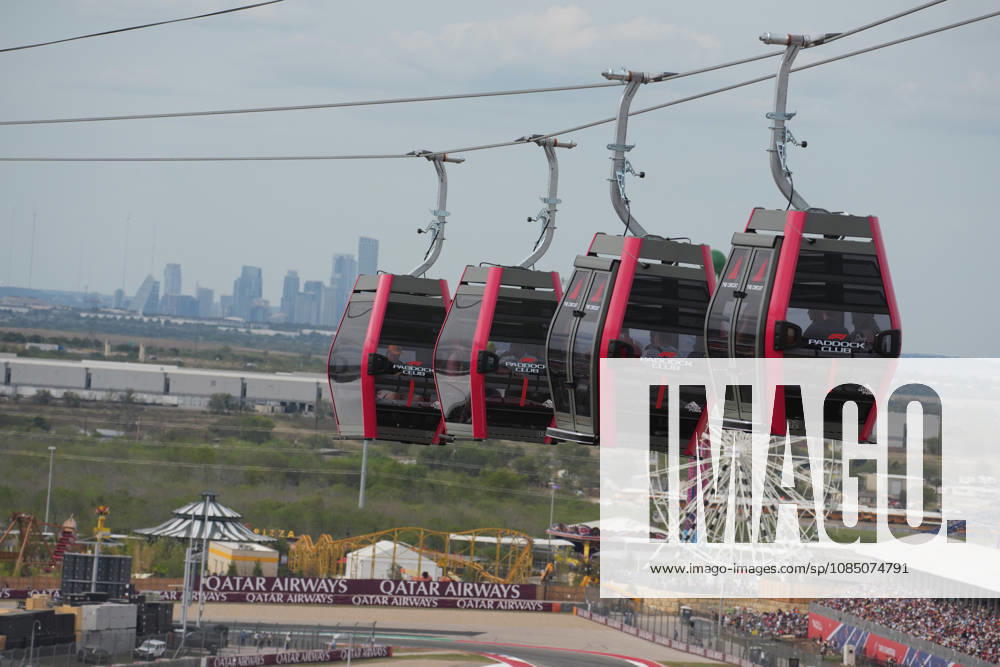 Circuit of The Americas, Austin, 2026 FORMULA 1 MSC CRUISES UNITED STATES GRAND PRIX, Shuttles travel back and forth between the main building in the paddock and the new station at the first turn, with the Austin skyline in the background. Photo by Hasan Bratic, DeFodi Images