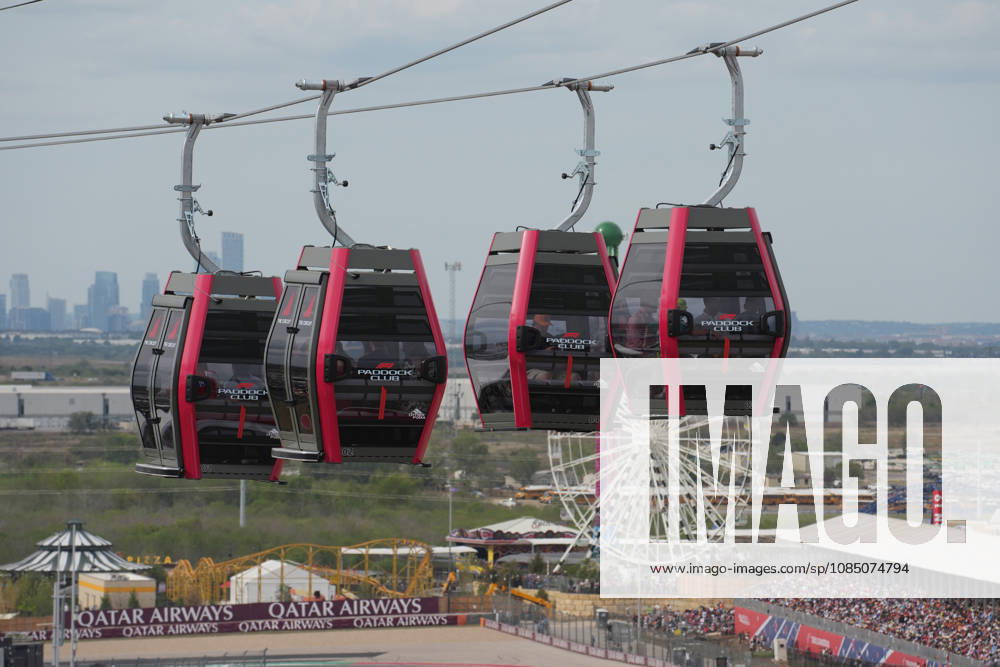 Circuit of The Americas, Austin, 2026 FORMULA 1 MSC CRUISES UNITED STATES GRAND PRIX, Shuttles travel back and forth between the main building in the paddock and the new station at the first turn, with the Austin skyline in the background. Photo by Hasan Bratic, DeFodi Images