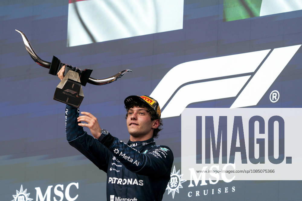 Italian Formula One driver Andrea Kimi Antonelli of Mercedes-AMG Petronas holds the winner s trophy on the podium for the Formula One United States Grand Prix at the Circuit of the Americas in Austin, Texas on Sunday, October 25, 2026. AUS2026102536 GREGxNASH