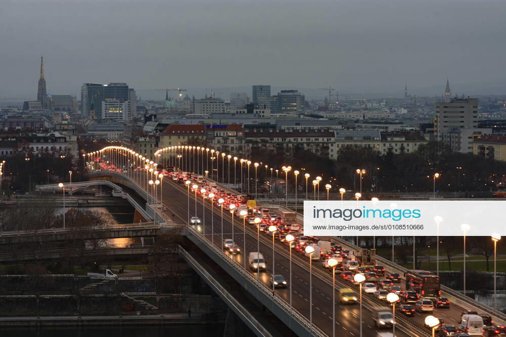 Vienna city center, river Donau (Danube), bridge Reichsbrücke, cathedral Stephansdom, traffic jam, high fog Wien, Vienna Wien Austria 00. overview