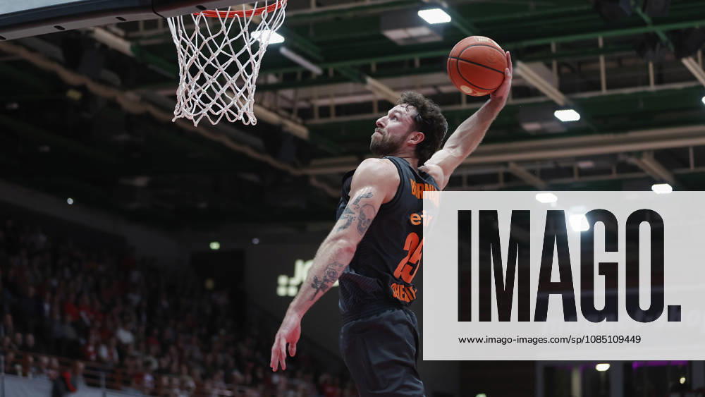 Pictured: Ben Burnham of the NINERS Chemnitz, age 25, making a dunk on October 26, 2026,Fitness First Würzburg Baskets vs. NINERS Chemnitz, easyCredit BBL, Matchday 6, Germany, 97072, tectake Arena Würzburg,