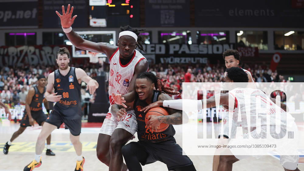 Pictured from left: Charles Thompson of the Würzburg Baskets, 32; Cobe Williams of the NINERS Chemnitz, 24, making a layup; and Eddie Colbert III of the Würzburg Baskets, 0 26 10 2026,Fitness First Würzburg Baskets vs. NINERS Chemnitz, easyCredit BBL, Matchday 6, Germany, 97072, tectake Arena Würzburg,