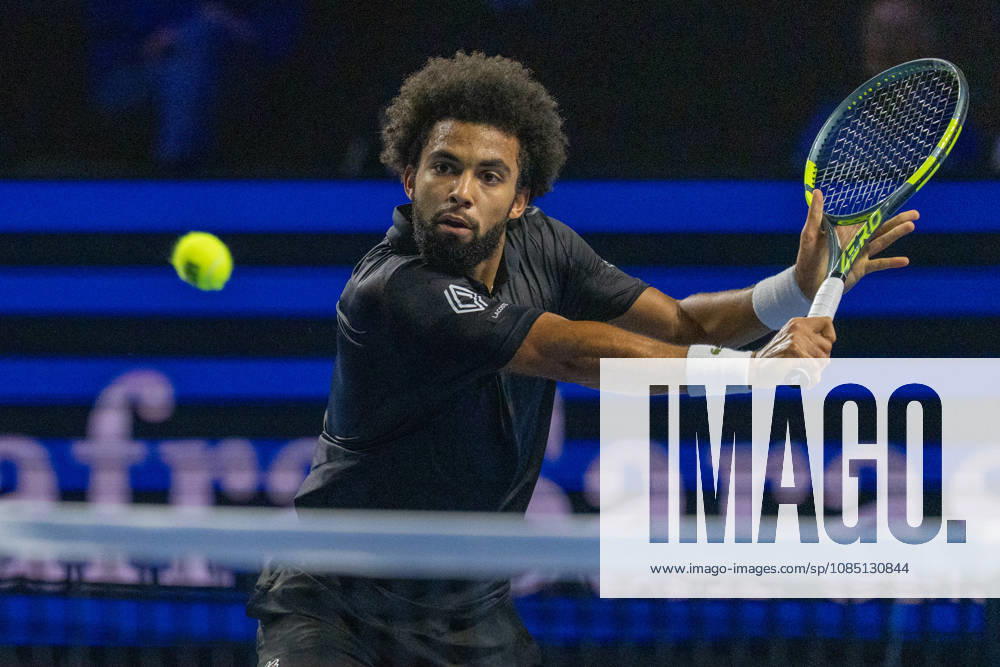 BASEL, SWITZERLAND, OCTOBER 27 Arthur Fils hits a backhand against Giovanni Mpetshi Perricard of France during Day 4 of the Swiss Indoors Basel at St. Jakobshalle on October 27, 2026, in Basel, Switzerland