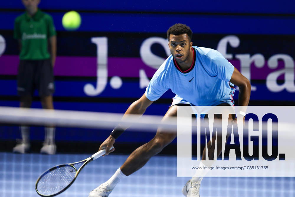 27th October 2026; St. Jakobshalle, Basel, Switzerland; ATP, Tennis Herren Tennis, Swiss Indoors Basel, Day 4; First round match; Giovanni Mpetshi Perricard of France slides for the ball against Arthur Fils of France AnthonyxBenoit