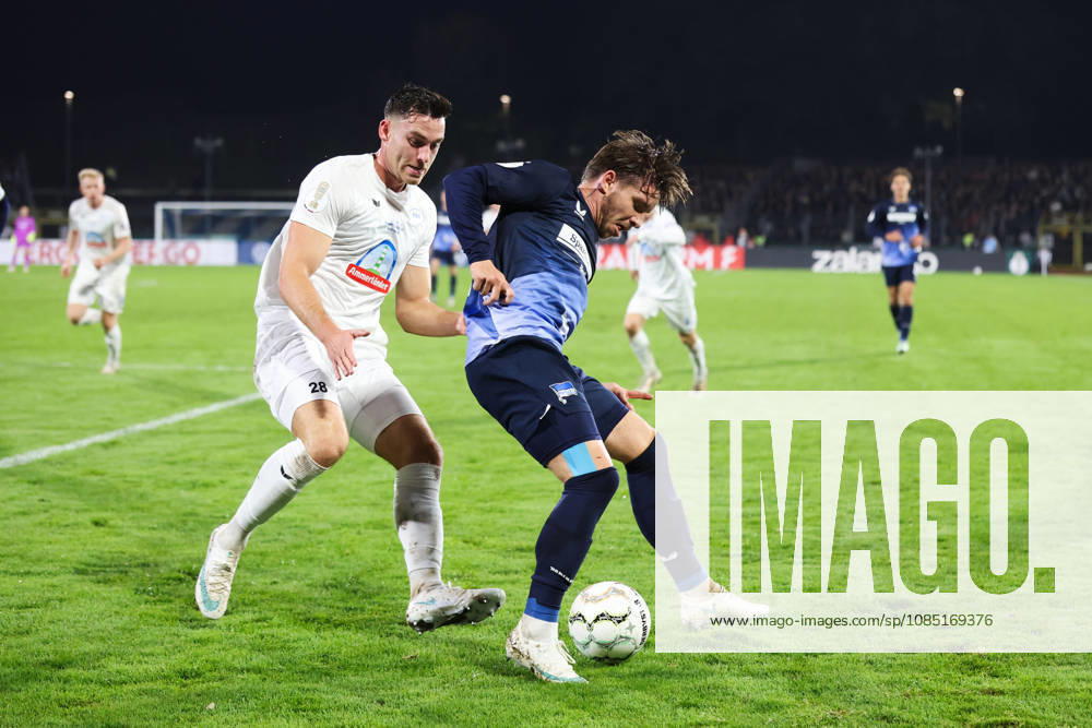 Soccer, Men s, DFB Cup, 2nd Round, SSV Jeddeloh II vs. Hertha BSC Berlin, Niklas von Aschwege 28 (SSV Jeddeloh II) in a tackle with Mats Pedersen 22 (Hertha BSC Berlin)