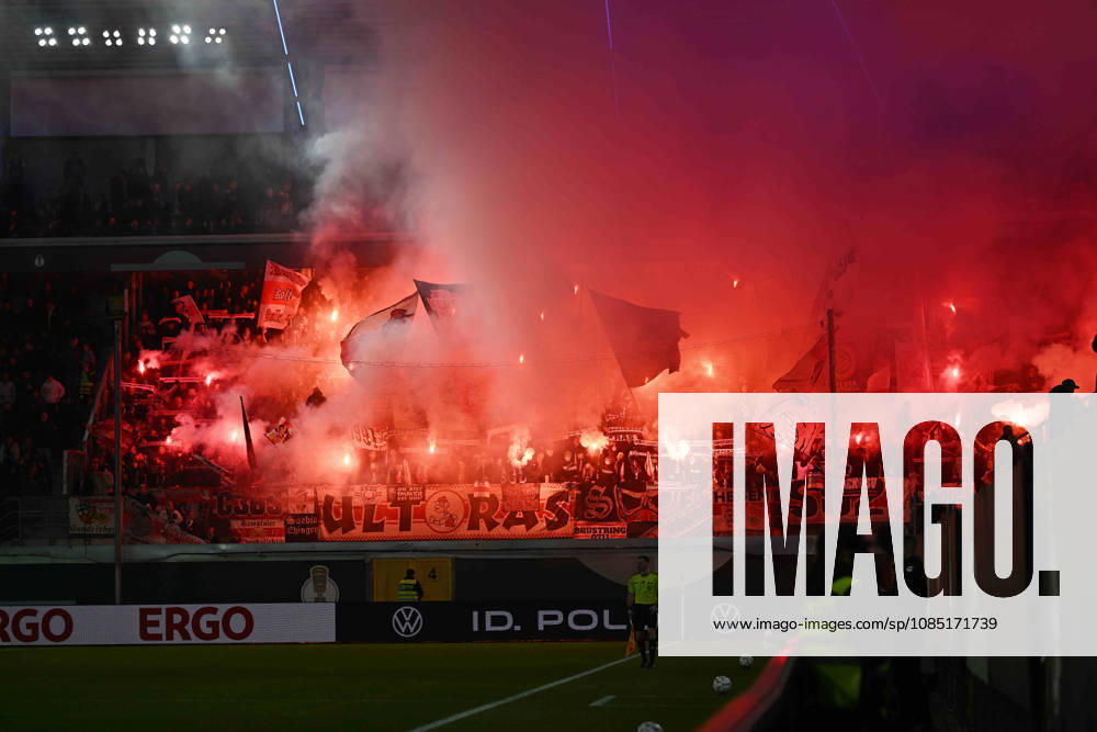 Paderborn, Home Deluxe Arena, October 28, 2026, GER, Men s, DFB Cup, 2nd Round, 2026–2027 Season, SC Paderborn vs. VfB Stuttgart, Image: Fan section, fans, Stuttgart fan block, fire, smoke, Bengali, Bengalis, Bengali fire, lighting fireworks, smoke bomb. For editorial use only. DFB regulations prohibit any use of photographs as image sequences and or quasi-video. North Rhine-Westphalia, Germany