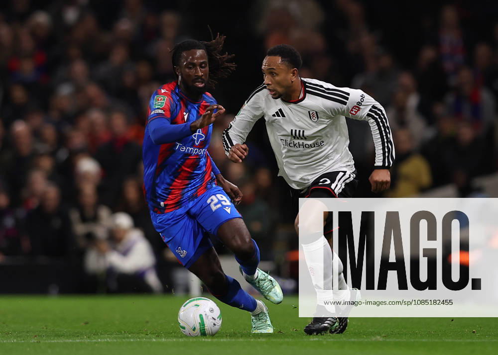 28th October 2026; Craven Cottage, London, England; Carabao Cup Football, Fulham versus Crystal Palace; Kenny Tete of Fulham under pressure from Evann Guessand of Crystal Palace JohnxPatrickxFletcher