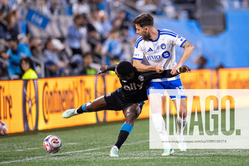 Charlotte FC forward Rodolfo Aloko (37) contends with CF Montreal defender Luca Petrasso (13) during the first half of the MLS, Fussball Herren, USA match up at Bank of America Stadium in Charlotte, NC. Mandatory Credit: -Cal Media Charlotte United States - ZUMAc04_ 20261028_zma_c04_028