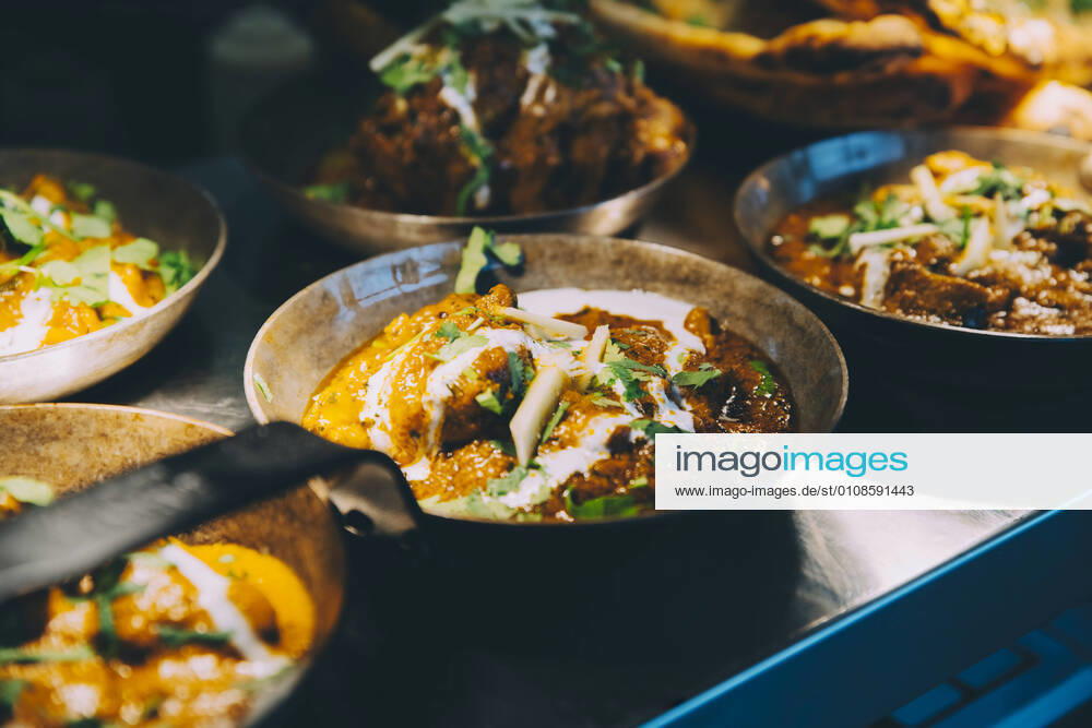 High angle view of indian food served on concession stand of commercial land vehicle Sweden, Stockholm, property released