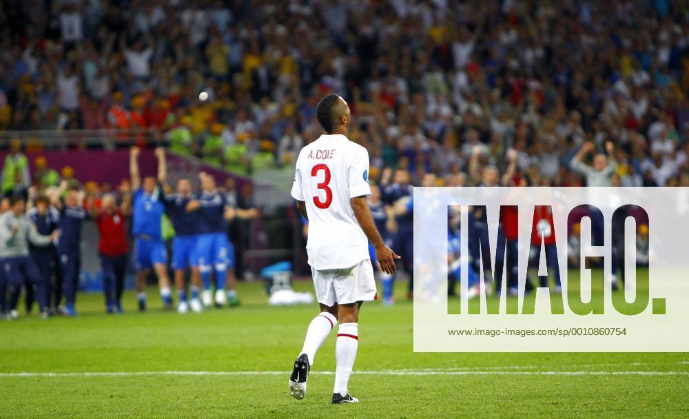 Ashley Cole of England reacts to missing his penalty..Euro 2012 Quarter Final match, England v Italy at the Olympic Stadium, Kiev, Ukraine on the 24th June 2012. Pic Jake Badger SPORTIMAGE... .
