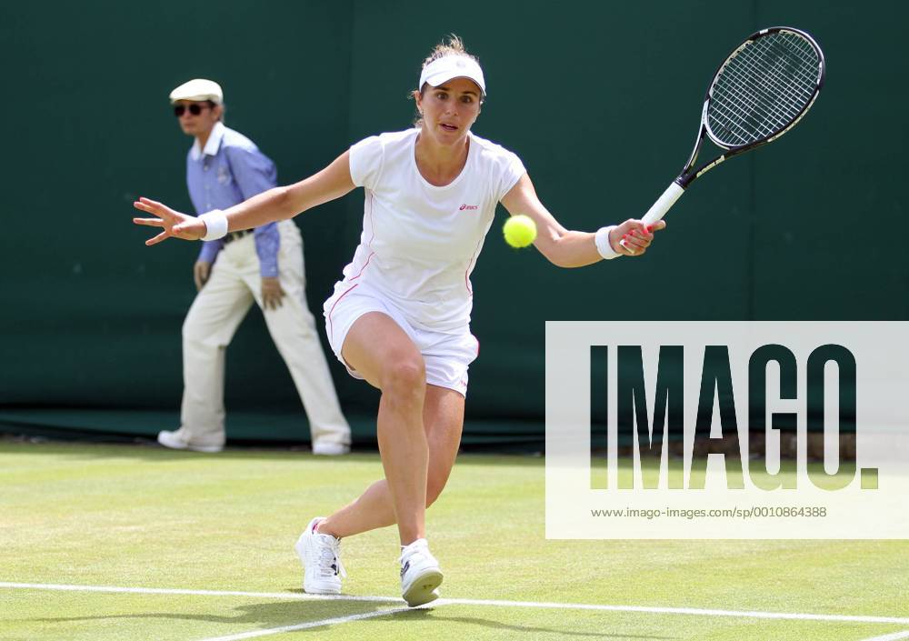 Spain s Maria Jose Sanchez returns in her match on the third day of the 2012 Wimbledon championships in London, June 27, 2012. LON2012062705