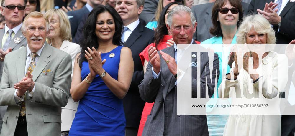 L-R Sir Bruce Forsyth and his wife Wilnelia,His Royal Highness Prince Charles and Camilla Duchess of Cornwall enjoy the tennis in the Royal box on the third day of the 2012 Wimbledon championships in London, June 27, 2012. LON2012062716
