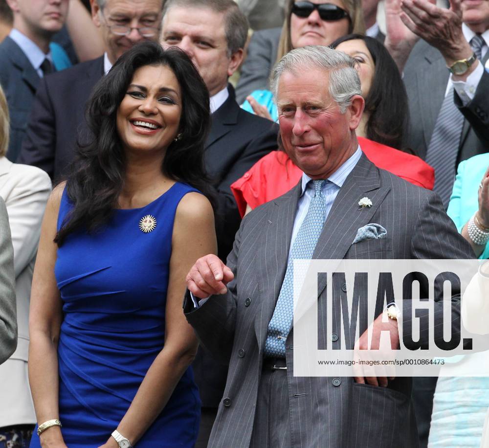 Lady Wilnelia Forsyth (L), His Royal Highness Prince Charles enjoy the tennis in the Royal box on the third day of the 2012 Wimbledon championships in London, June 27, 2012. LON2012062718