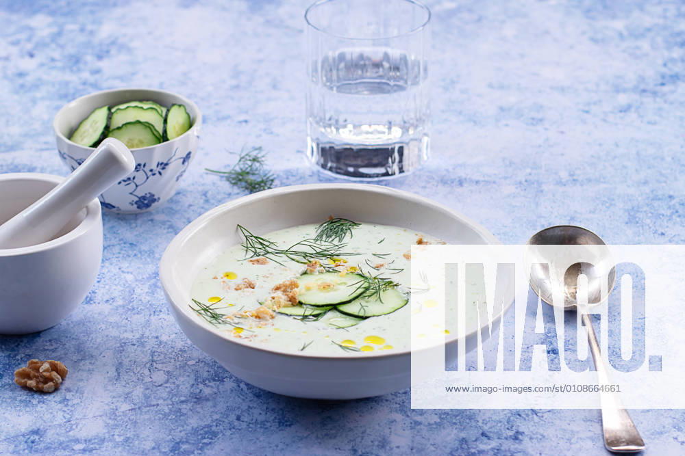 From above cold cucumber and dill soup named Tarator on rustic table
